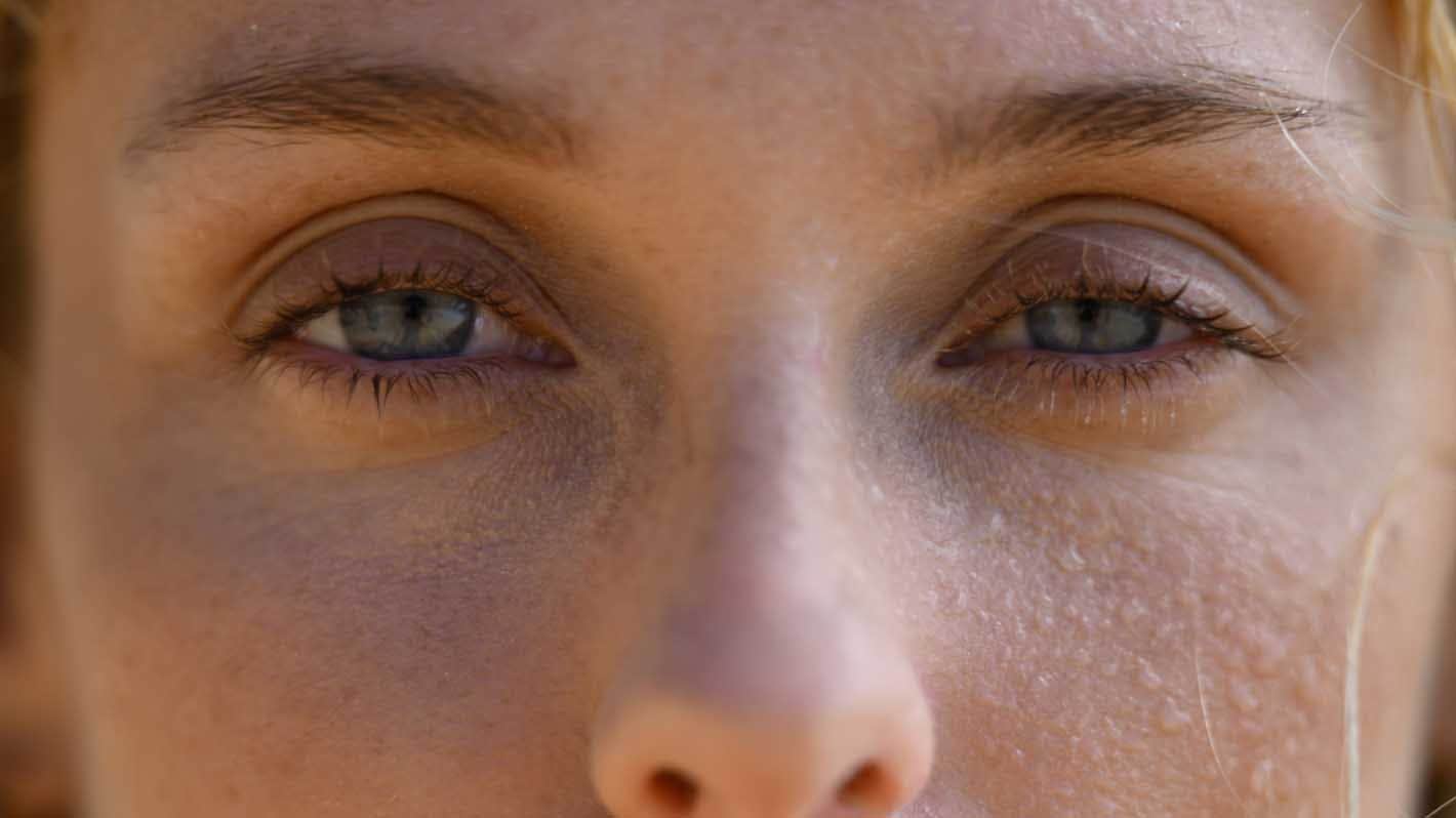 Fine detail of sweat beading on woman's face photographed with NIKKOR Z 70-200mm f/2.8 VR S II | Nikon Cameras, Lenses & Accessories