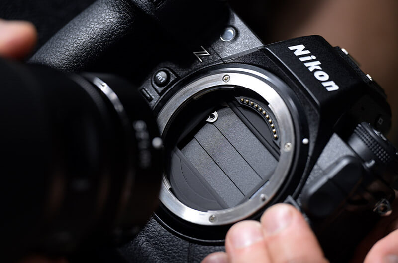 Photo of the Z 9 in a person's hand showing the sensor shield